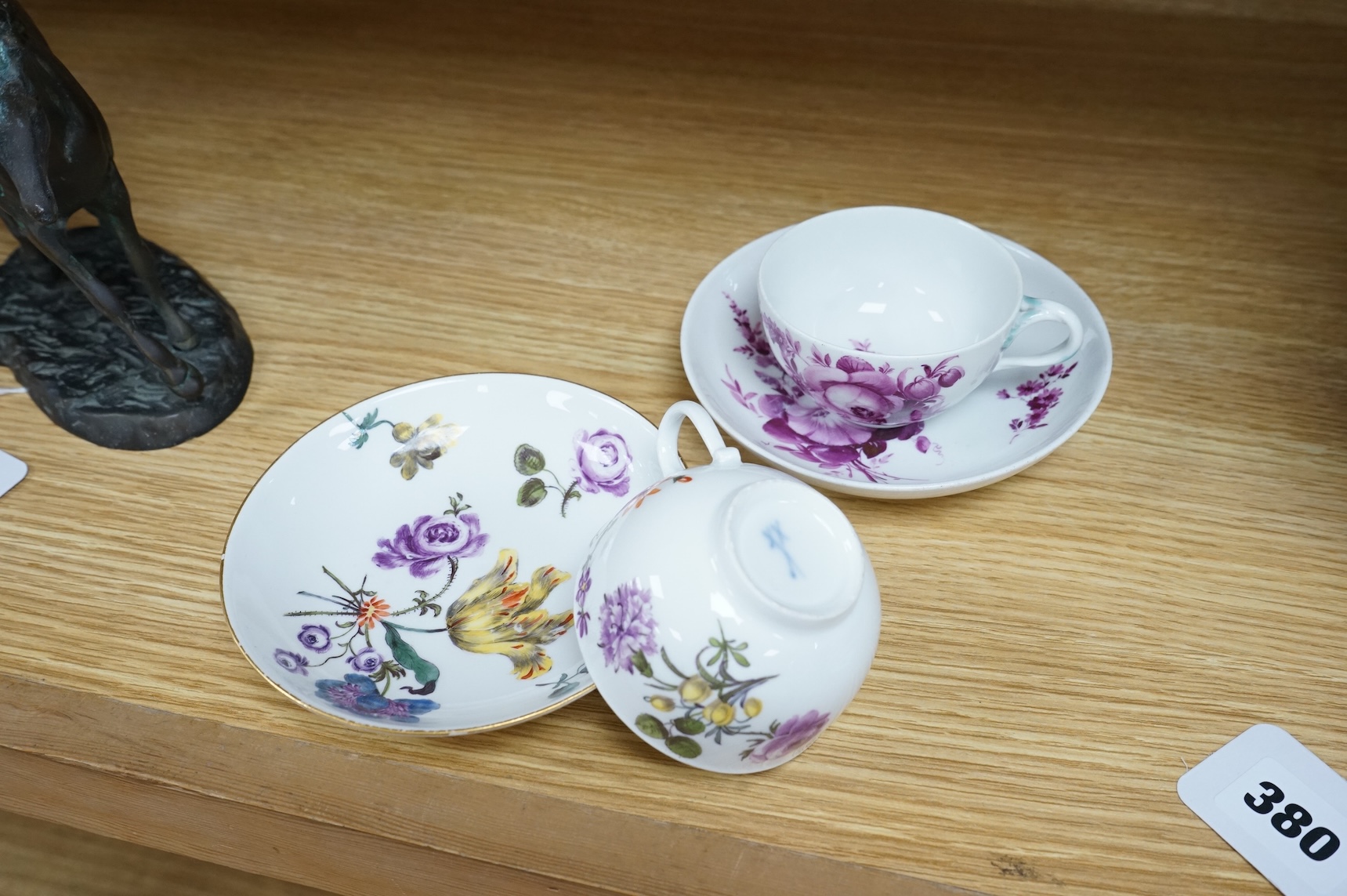 Two 18th century Meissen floral decorated teacups and saucers, largest saucer 13.5cm diameter